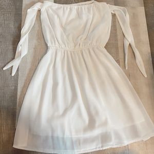 white dress ties on arms